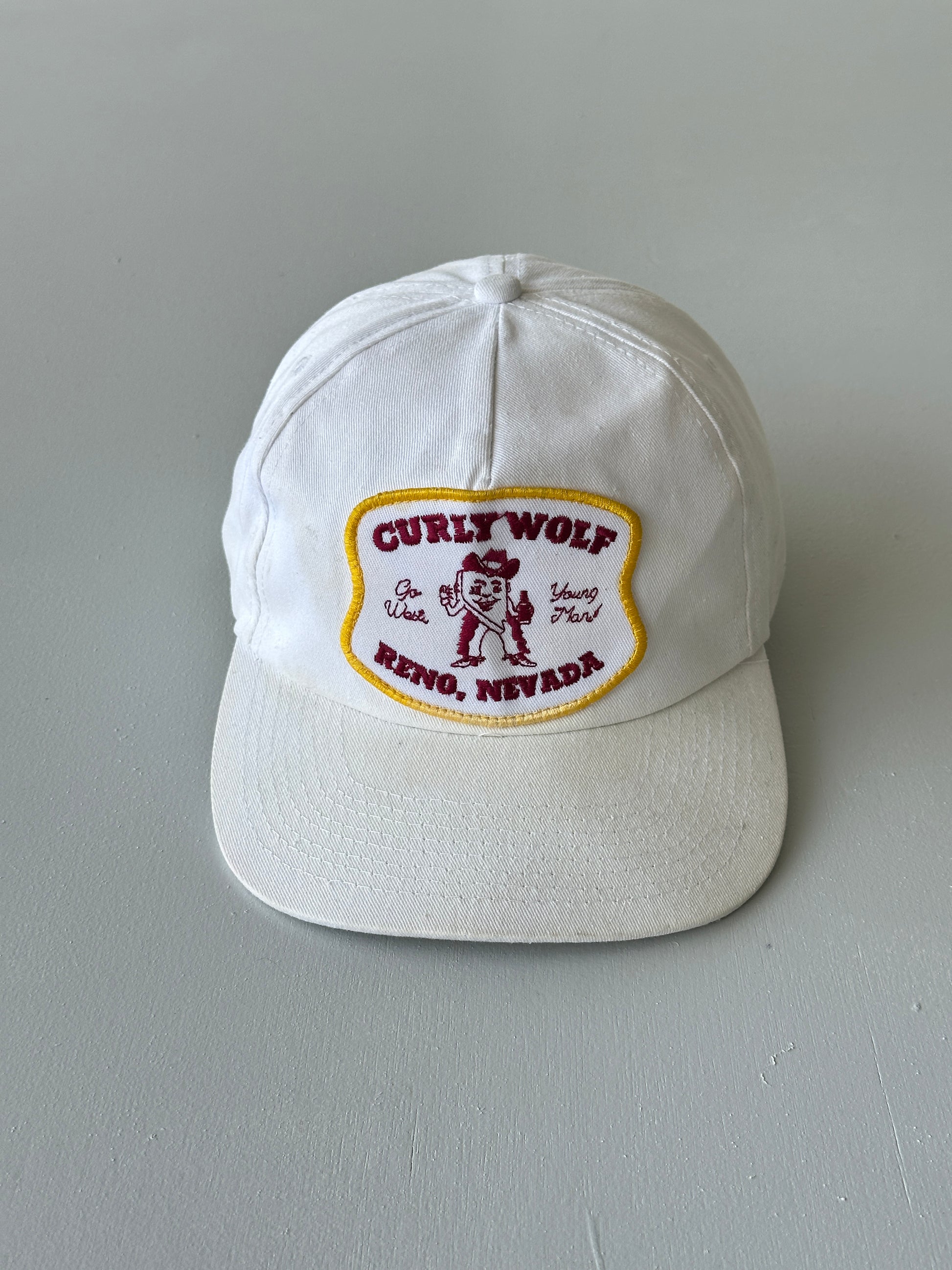 White Curly Wolf Reno Nevada 80's Vintage SnapBack Trucker Cap