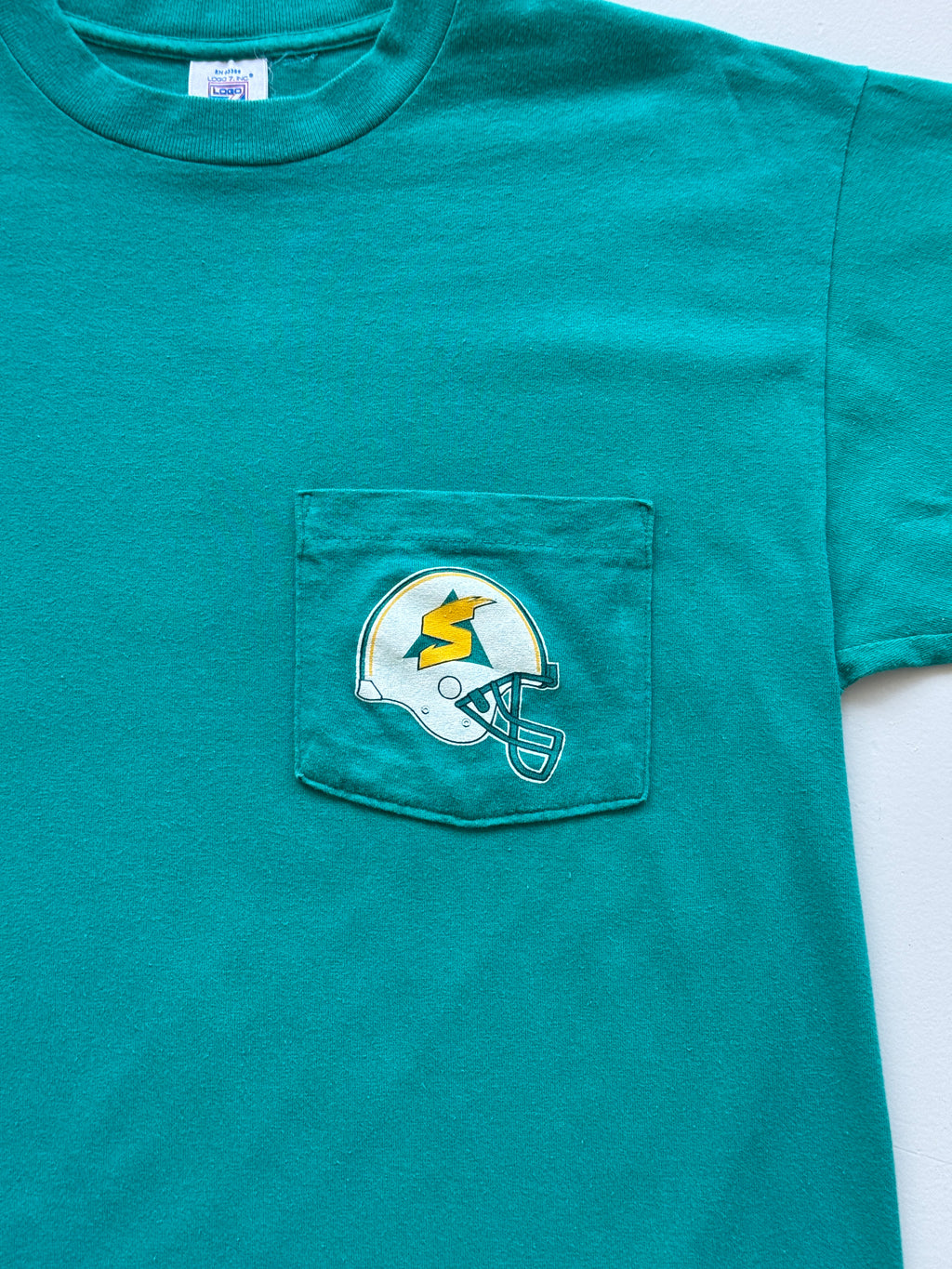 Teal Sacramento Surge 90's Vintage American Football Graphic Pocket T-Shirt - Me