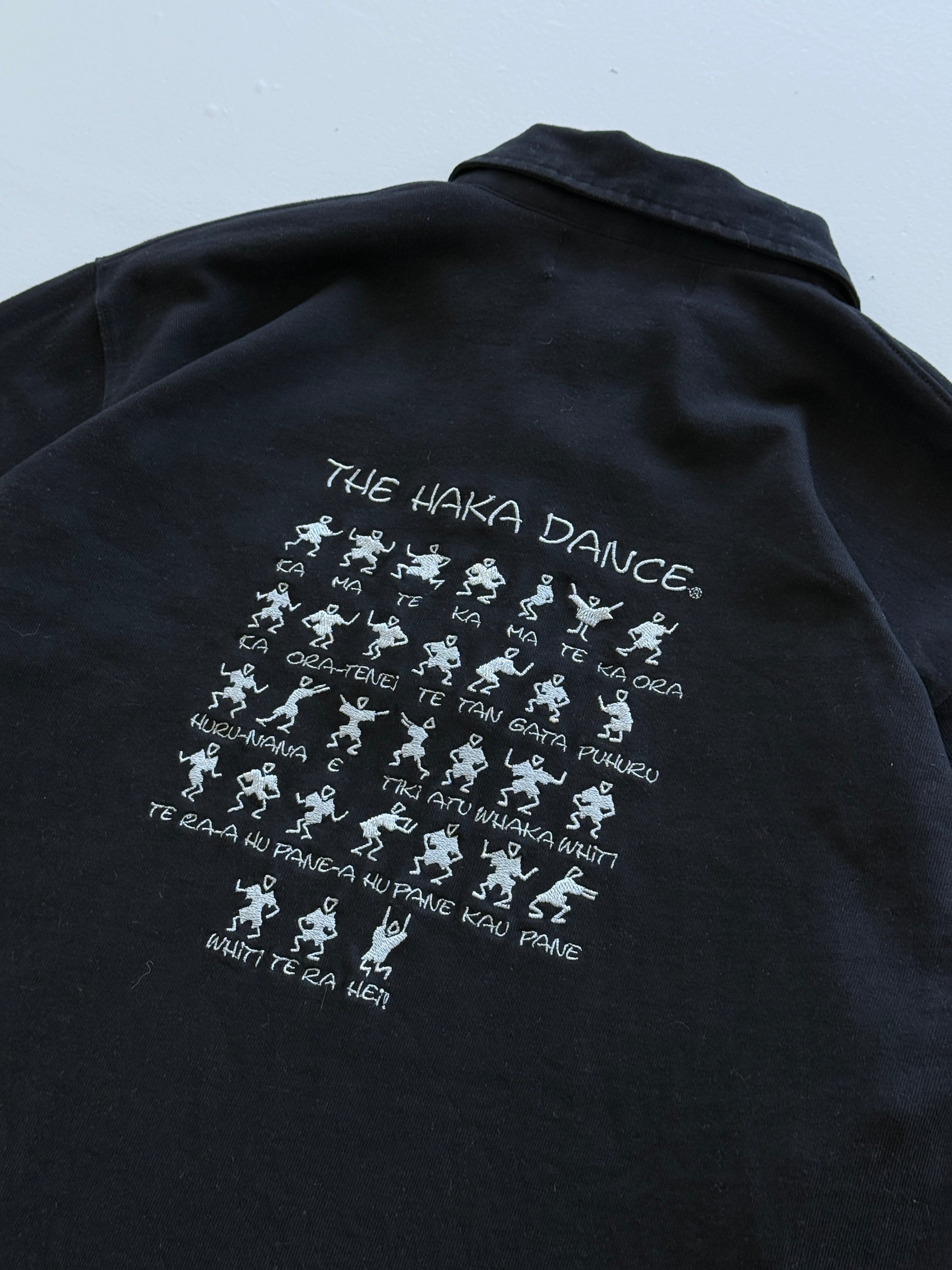 Black New Zealand Rugby 00's Vintage Haka Dance Graphic Polo Shirt - Medium