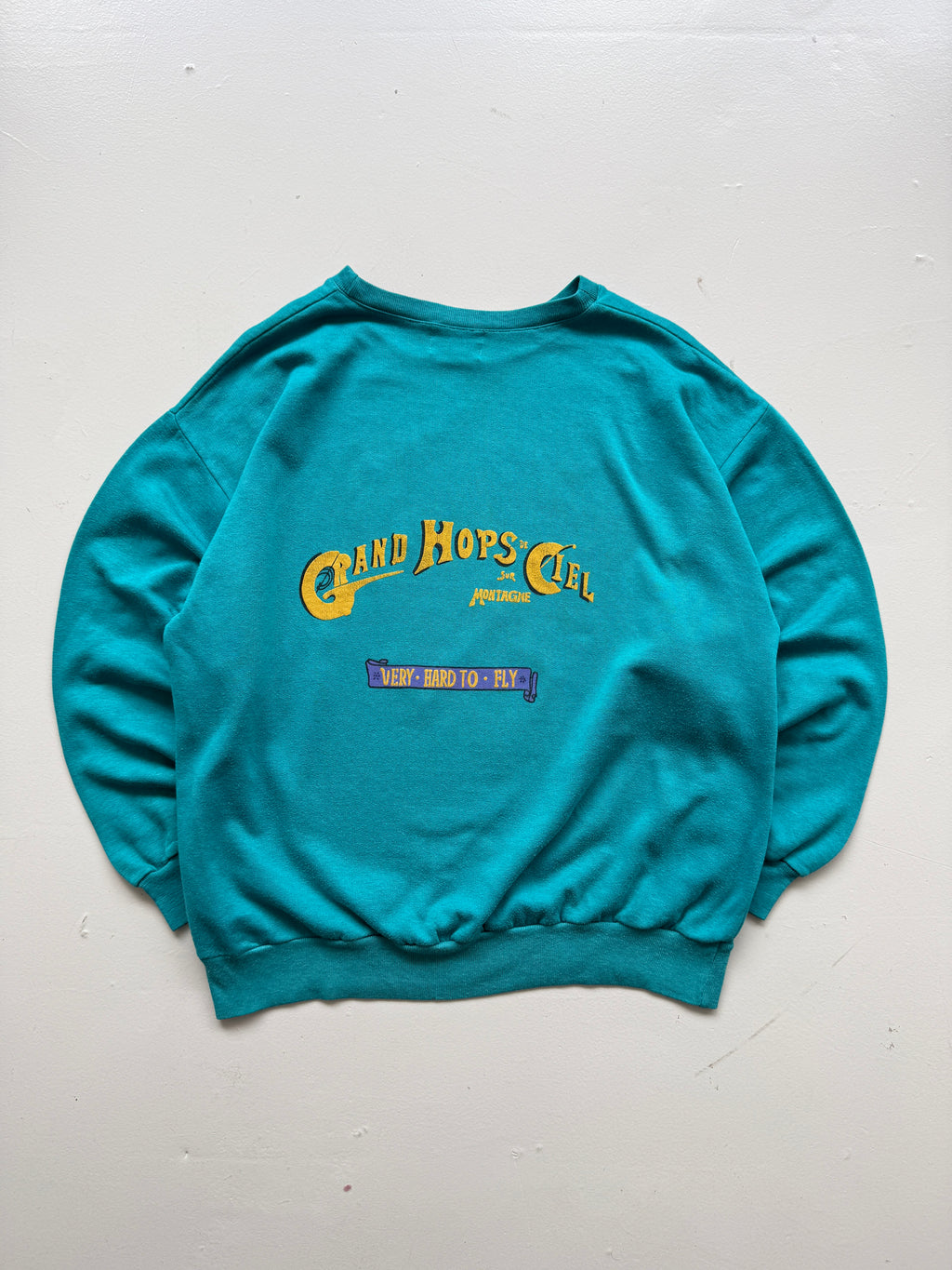 Grand Hops de Ciel Saint Olsen 80's Vintage Graphic Sweatshirt - Medium/Large