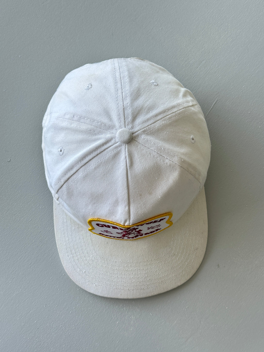 White Curly Wolf Reno Nevada 80's Vintage SnapBack Trucker Cap