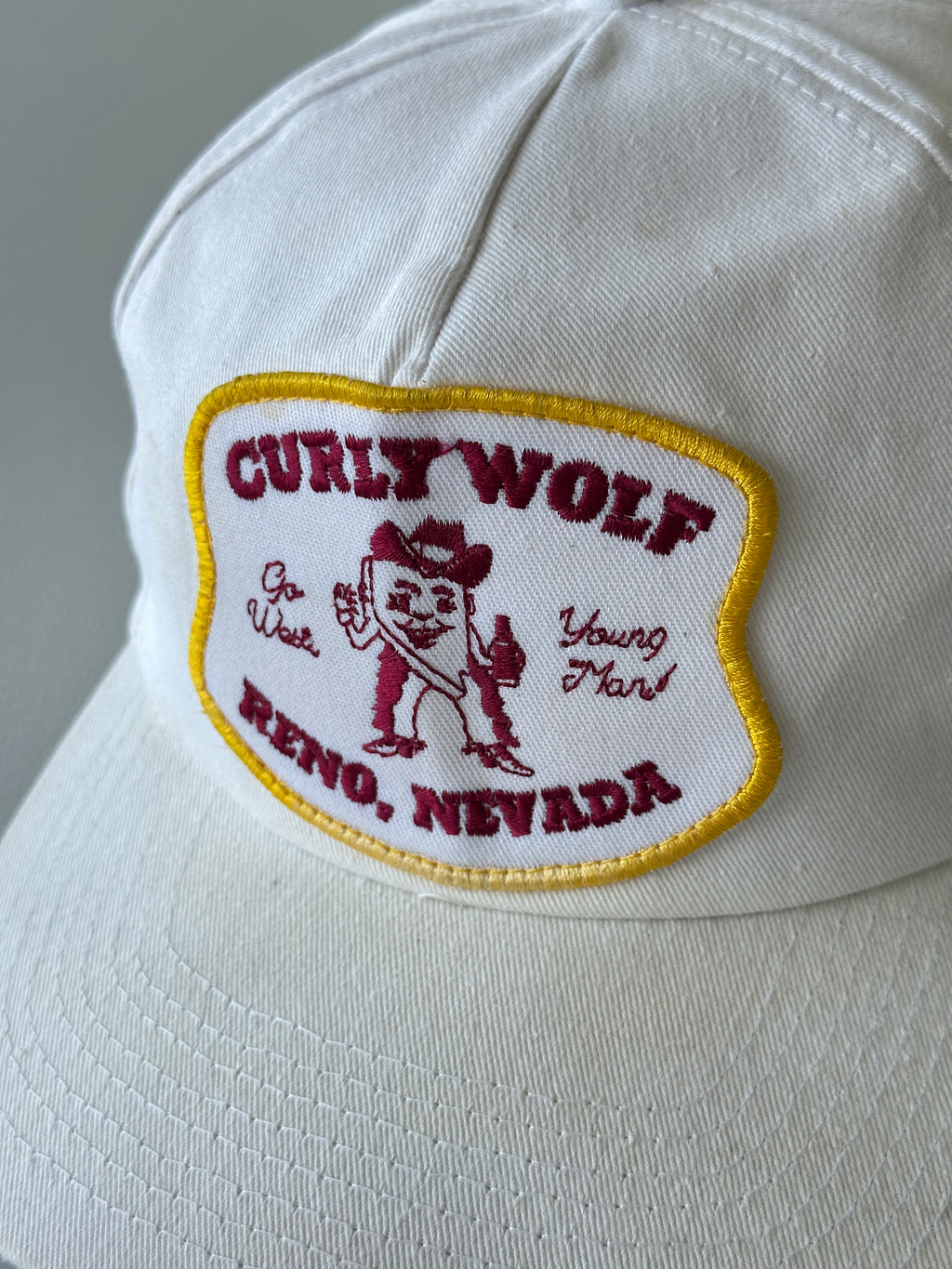 White Curly Wolf Reno Nevada 80's Vintage SnapBack Trucker Cap