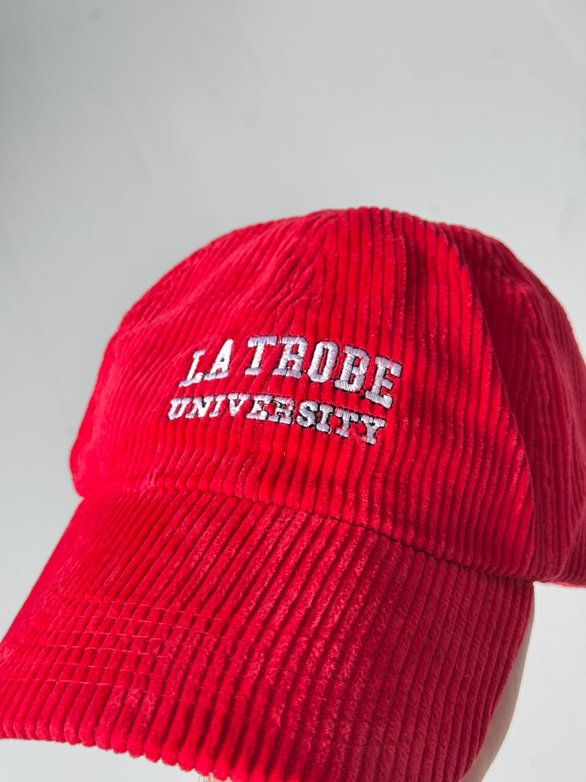 Red La Trobe University Vintage Corduroy SnapBack Trucker Cap