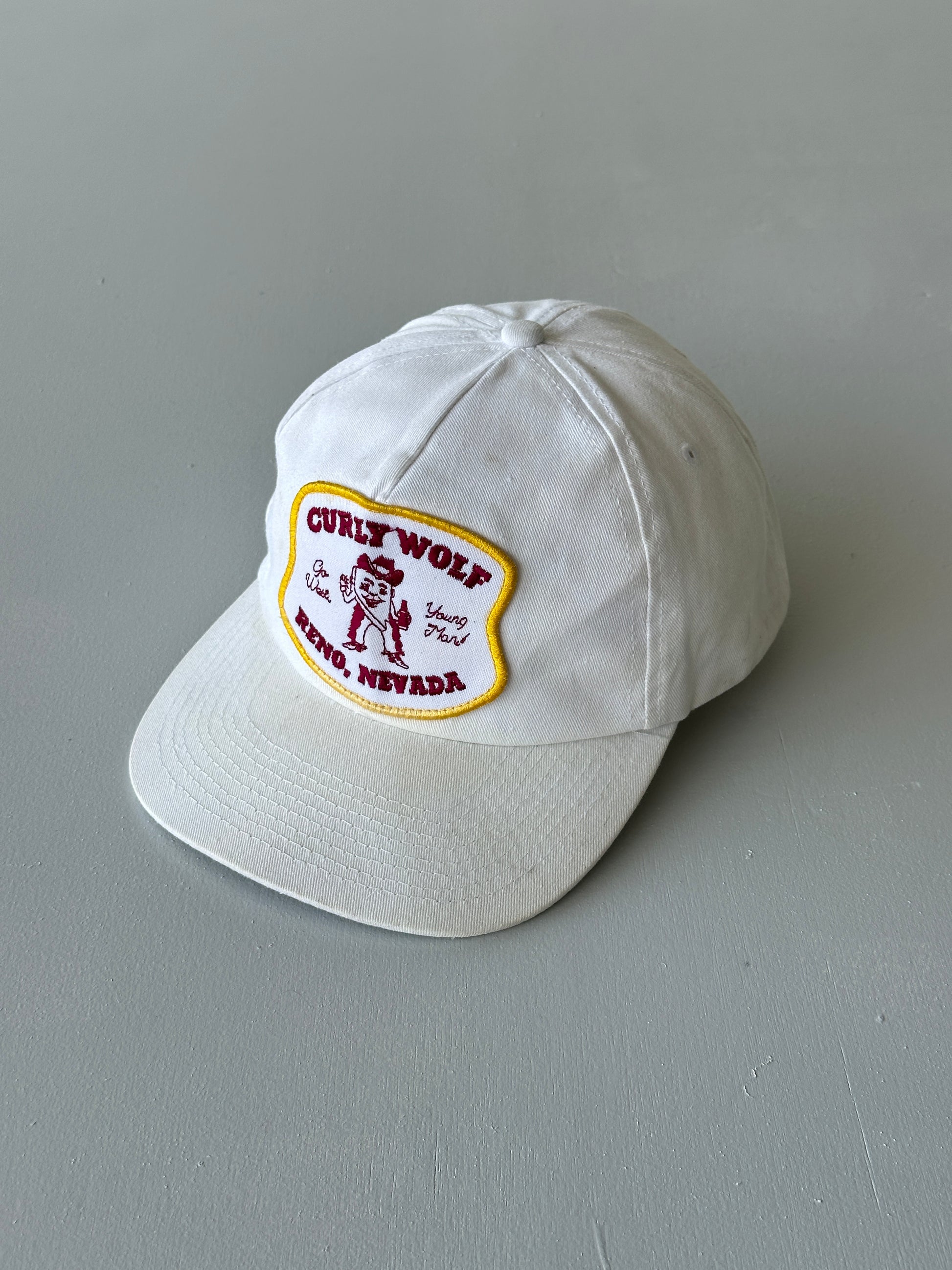 White Curly Wolf Reno Nevada 80's Vintage SnapBack Trucker Cap