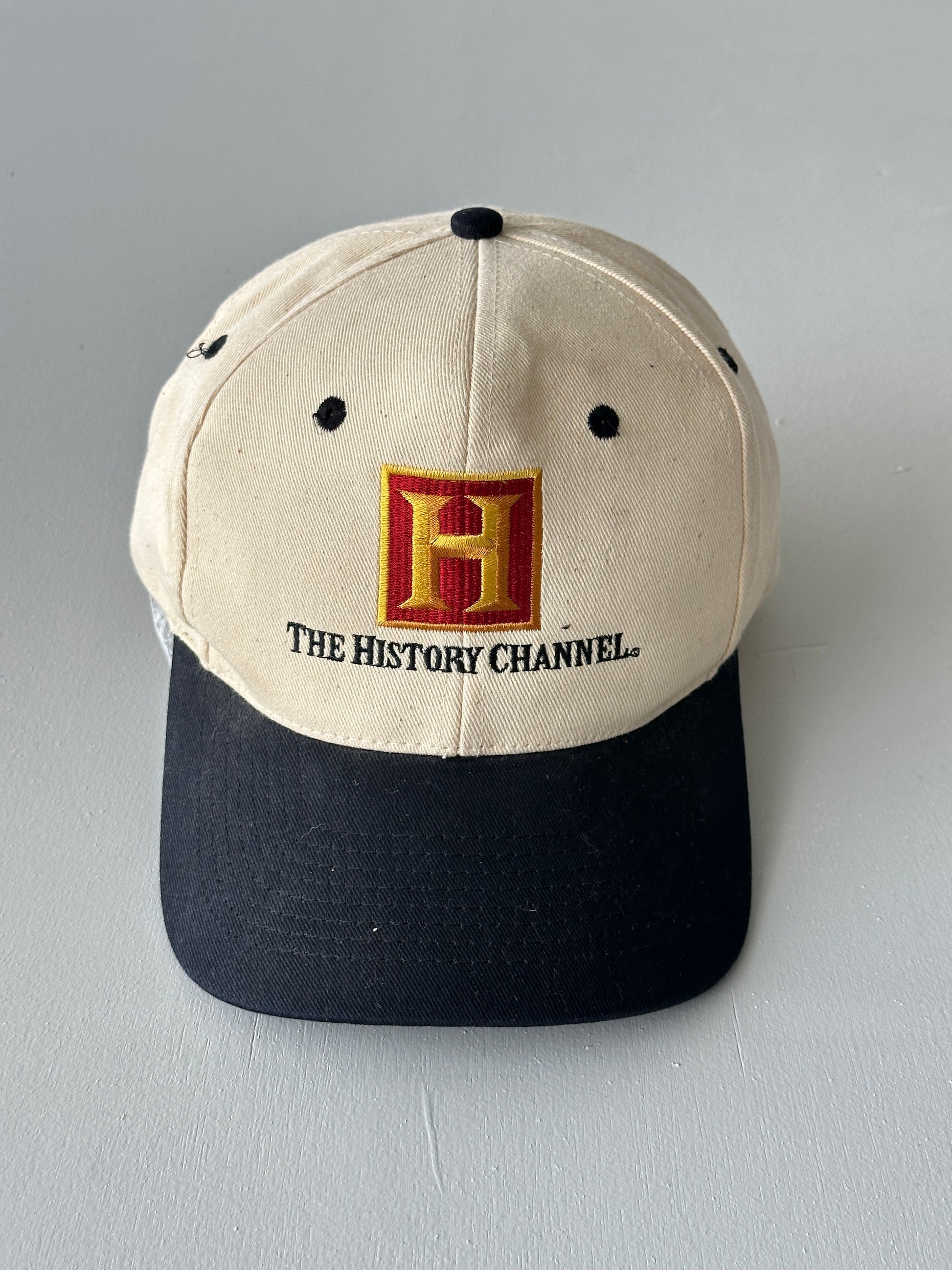 Cream / Black The History Channel 90's Vintage SnapBack Trucker Cap