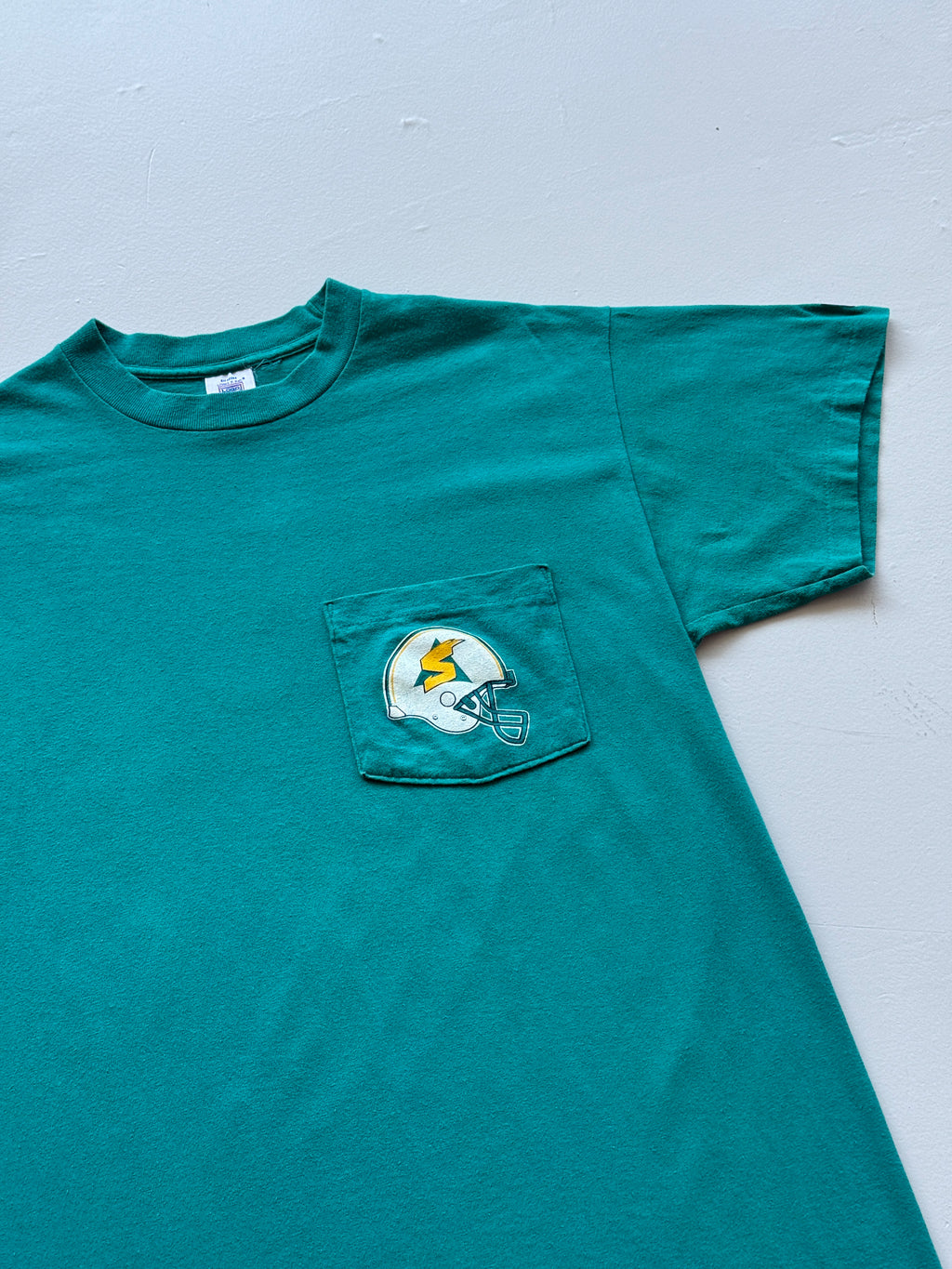 Teal Sacramento Surge 90's Vintage American Football Graphic Pocket T-Shirt - Me