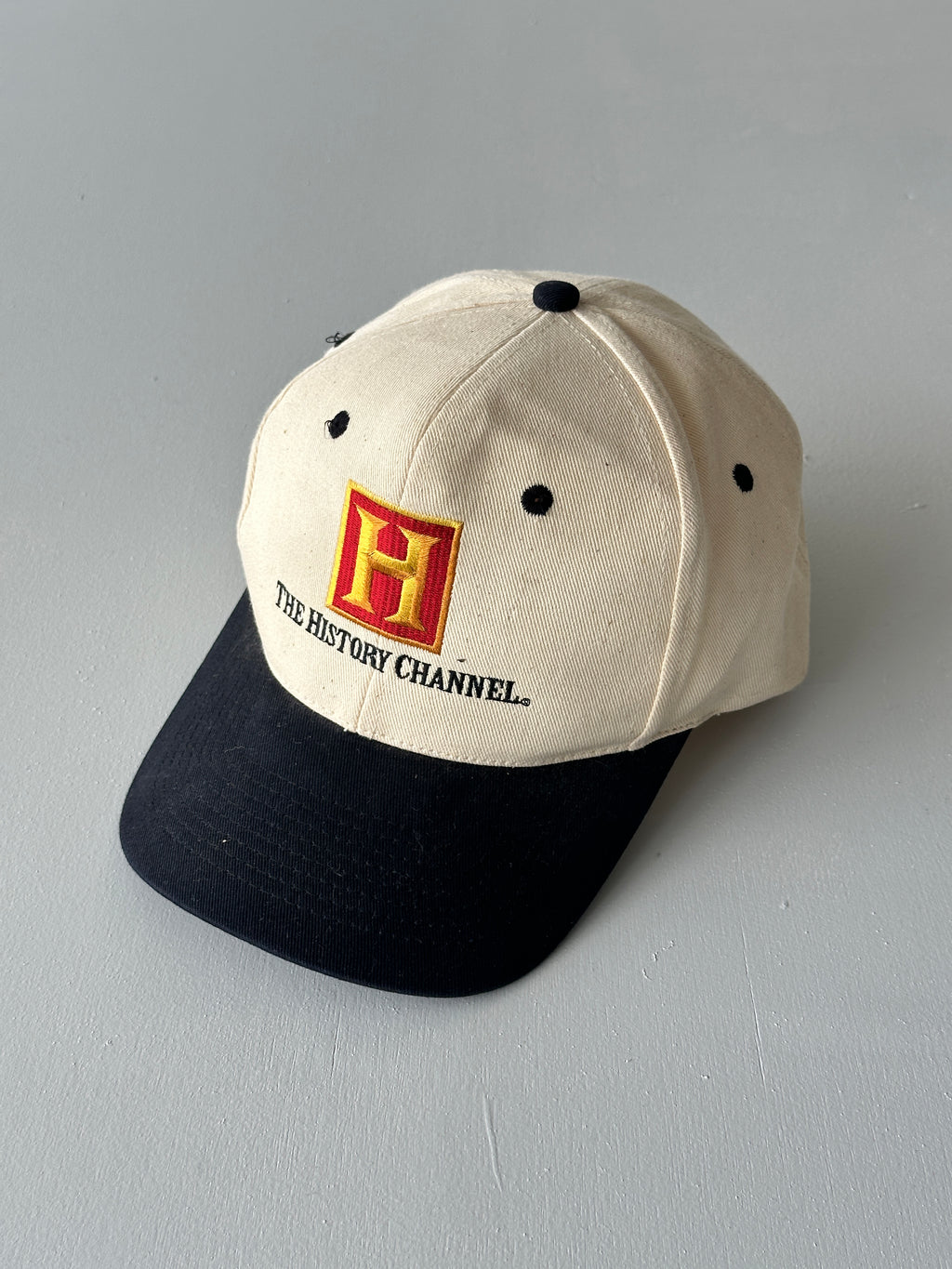 Cream / Black The History Channel 90's Vintage SnapBack Trucker Cap