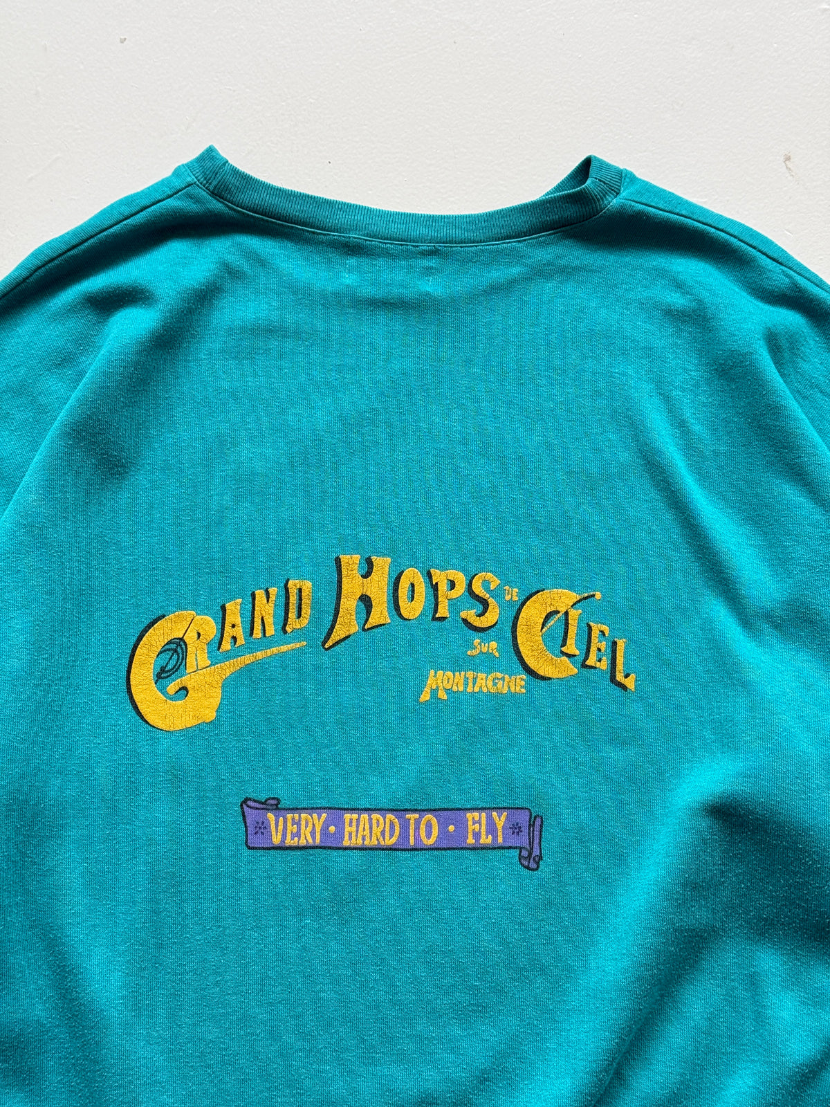 Grand Hops de Ciel Saint Olsen 80's Vintage Graphic Sweatshirt - Medium/Large
