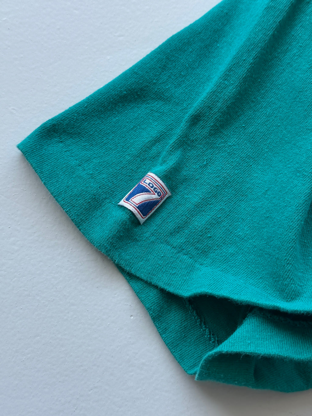 Teal Sacramento Surge 90's Vintage American Football Graphic Pocket T-Shirt - Me