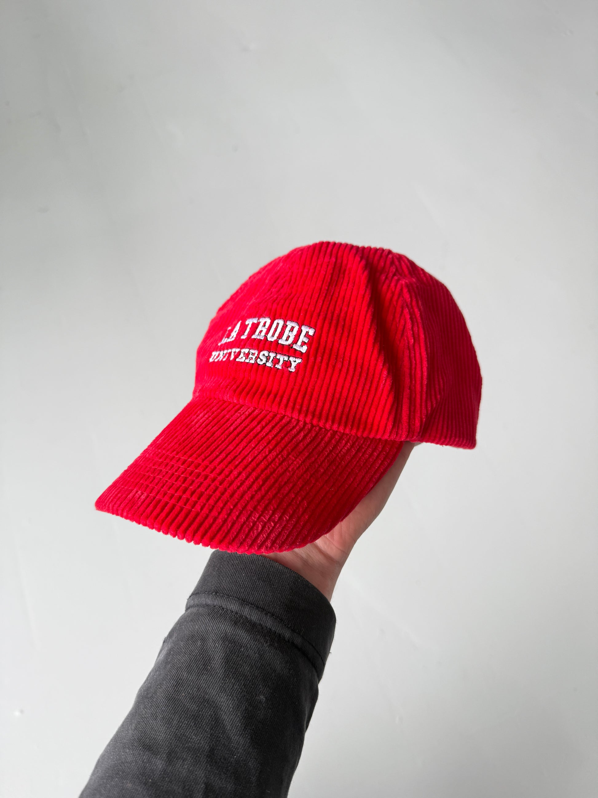 Red La Trobe University Vintage Corduroy SnapBack Trucker Cap