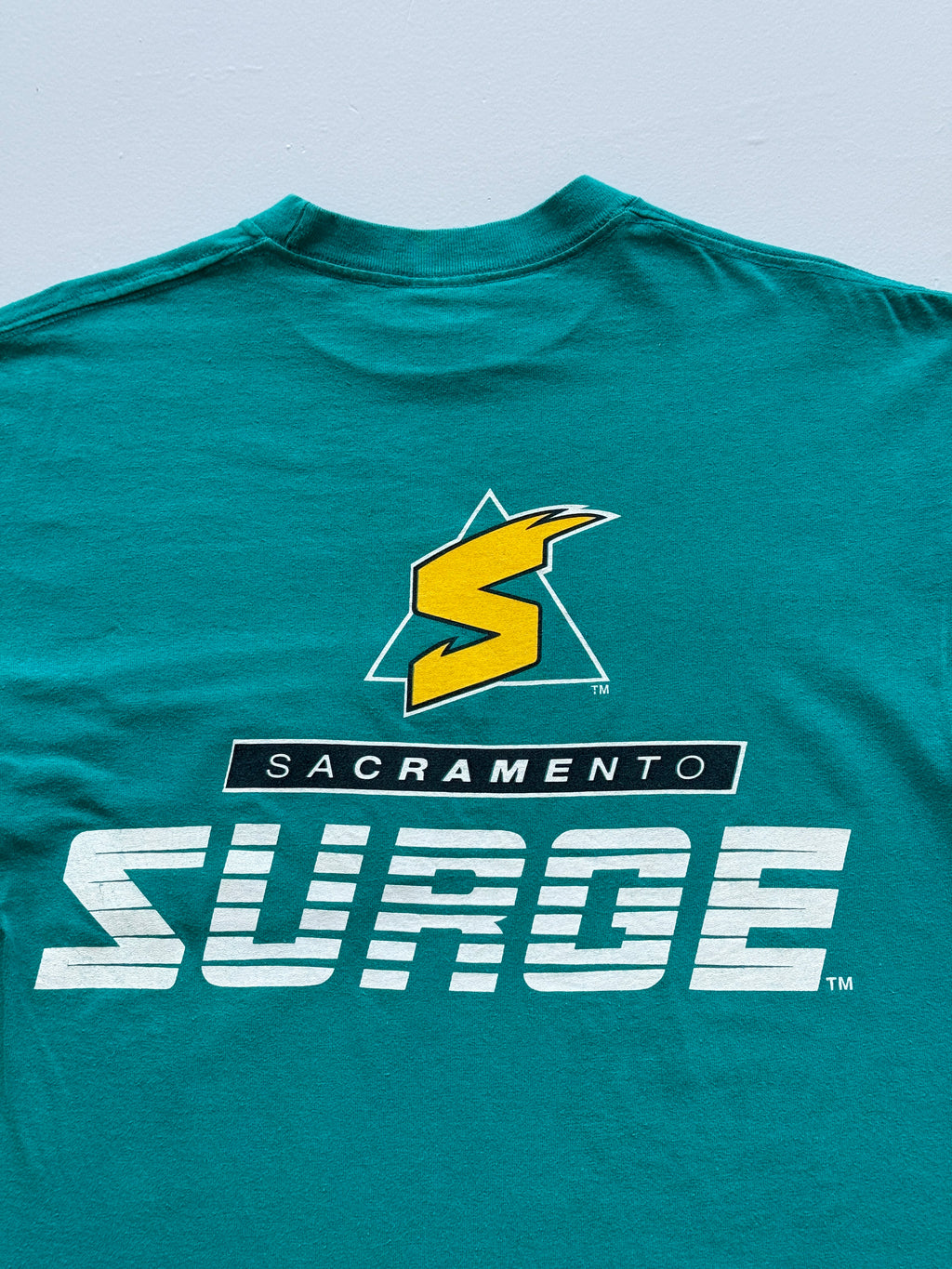 Teal Sacramento Surge 90's Vintage American Football Graphic Pocket T-Shirt - Me