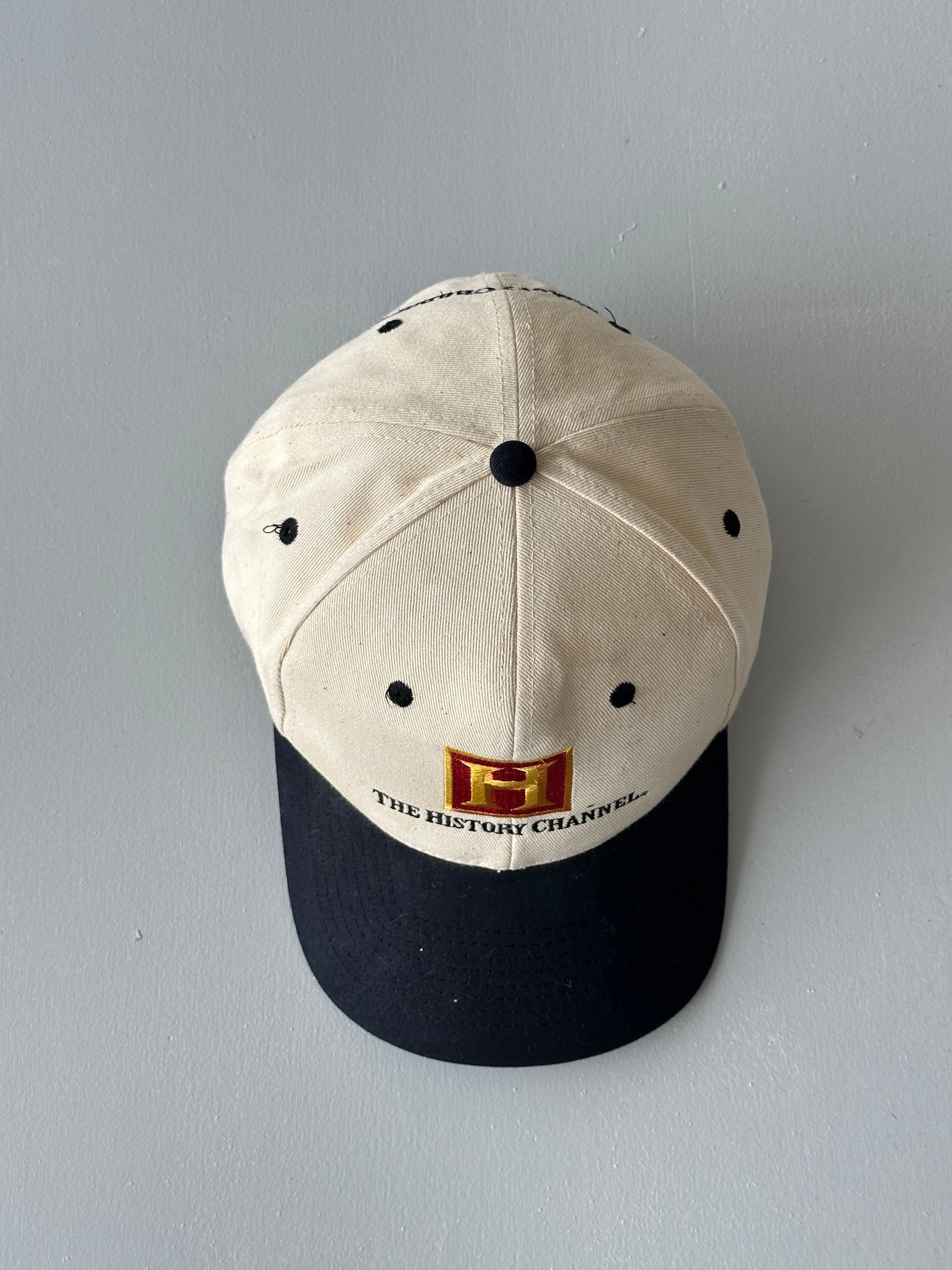 Cream / Black The History Channel 90's Vintage SnapBack Trucker Cap