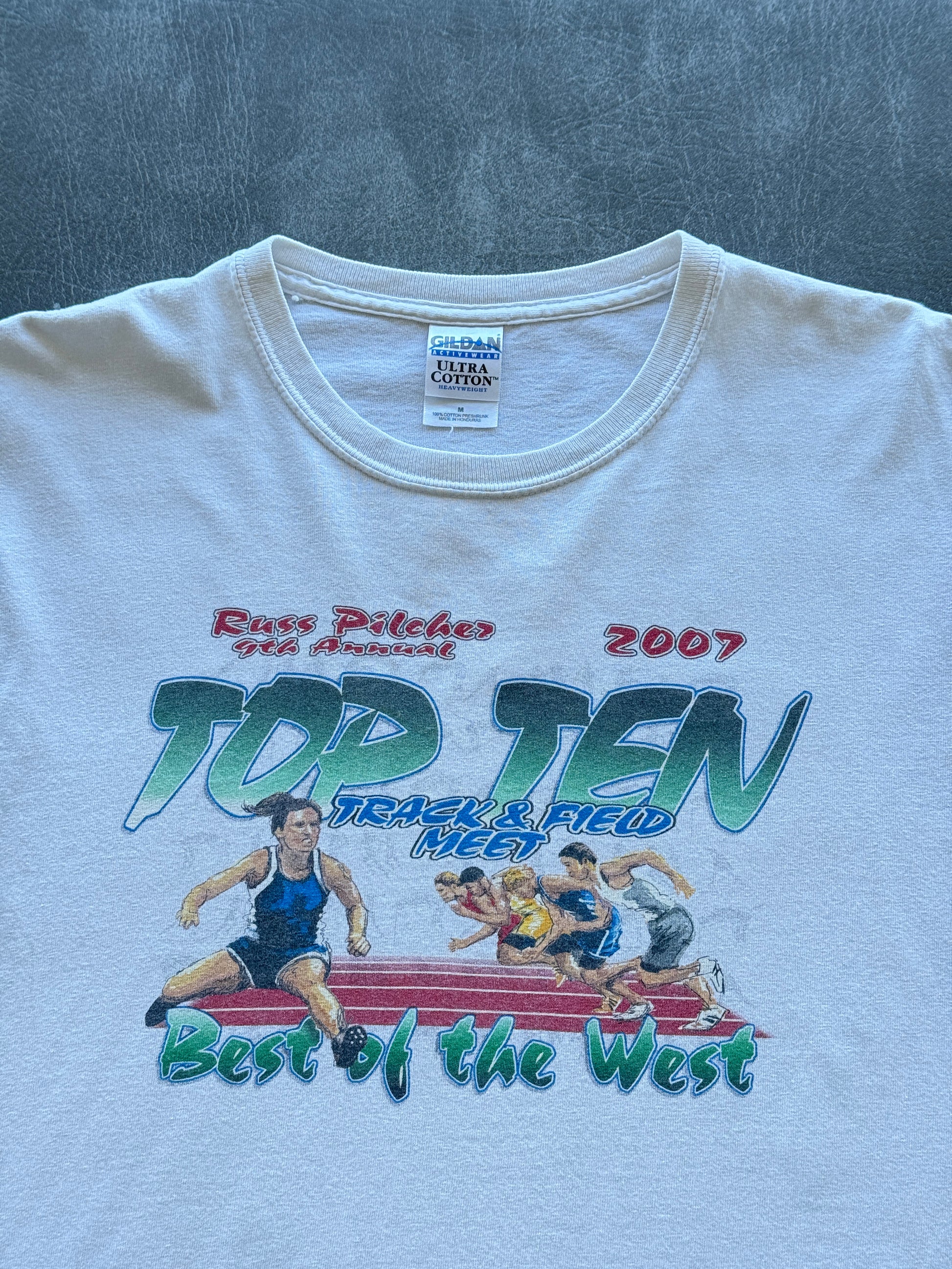 White Top Ten Track & Field Meet 2007 Vintage Graphic T-Shirt - Medium