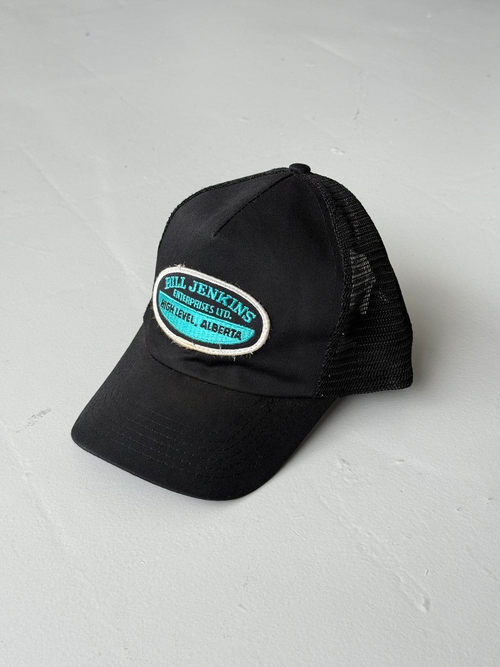 Black Bill Jenkins Vintage Canvas and Mesh SnapBack Trucker Cap