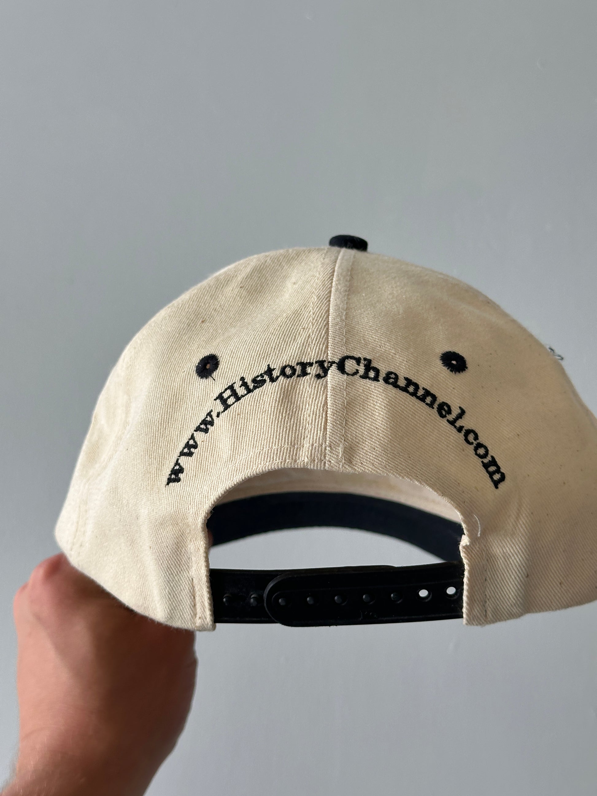 Cream / Black The History Channel 90's Vintage SnapBack Trucker Cap
