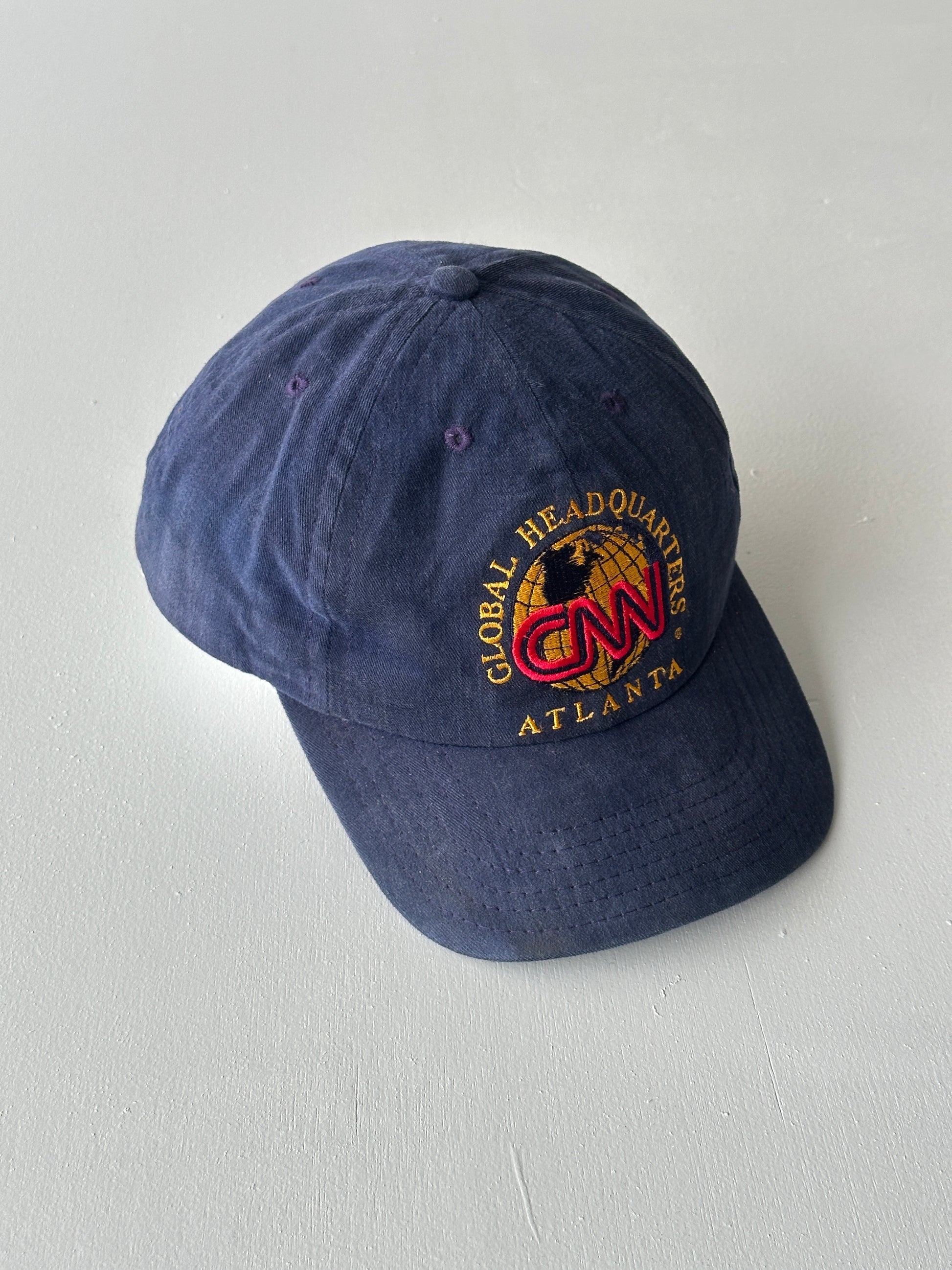 Navy CNN Global Headquarters 90's Vintage SnapBack Trucker Cap
