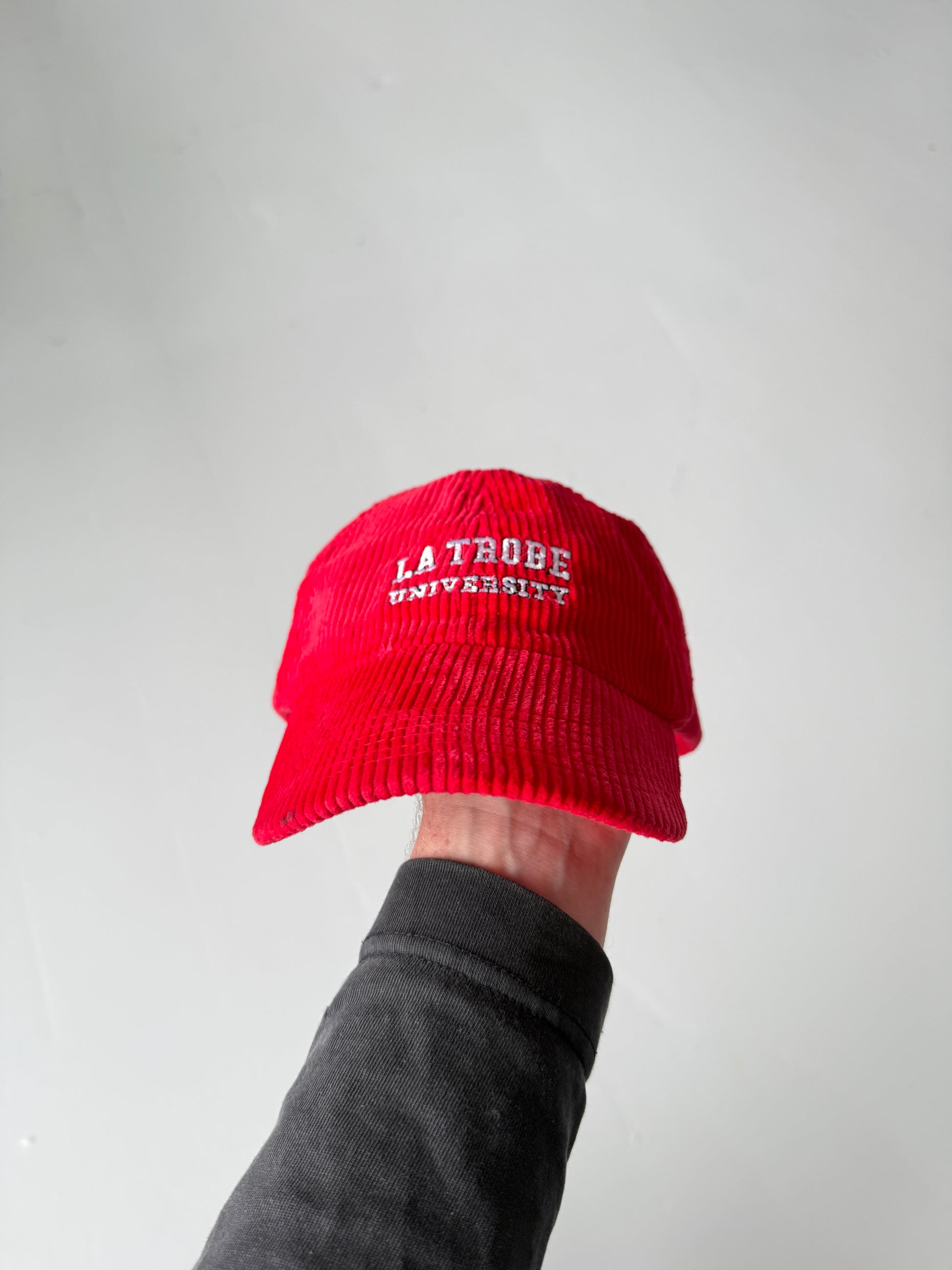 Red La Trobe University Vintage Corduroy SnapBack Trucker Cap